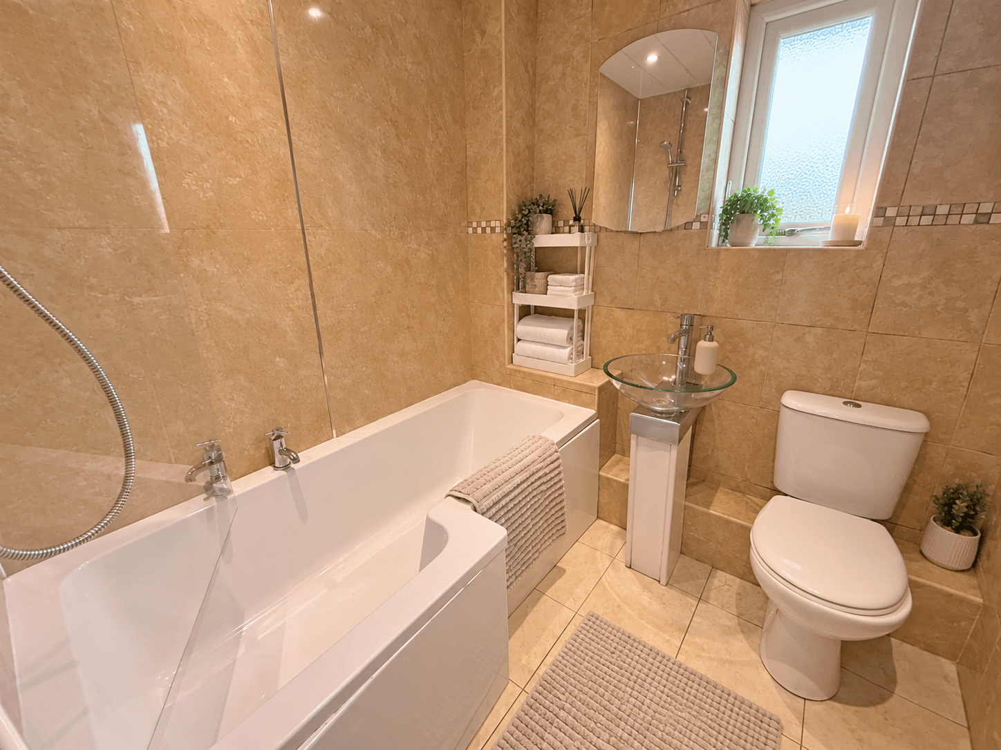 Family bathroom with bath and shower at Royal Quays